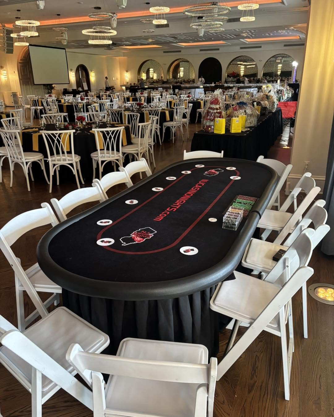 NJ Casino Nights poker table set up in an elegant ballroom